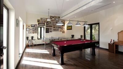 The five reception rooms include a study/library with a wooden floor to offer a studious atmosphere, a games room, majlis and formal dining room. Courtesy Knight Frank