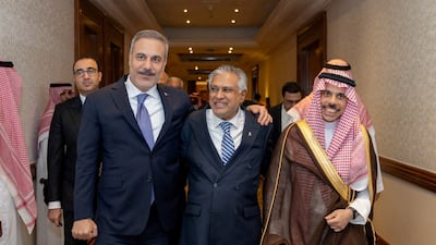 Turkish, Pakistani and Saudi foreign ministers Hakan Fidan, Ishaq Dar and Prince Faisal bin Farhan after a committee meeting of the Makkah defence pact in Riyadh on October 5. Turkish Foreign Ministry via Reuters