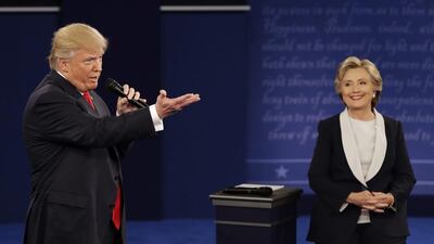 The US presidential candidates Donald Trump and Hillary Clinton have both embraced dishonesty in their quest to reach the top of the American political ladder. John Locher / AP Photo