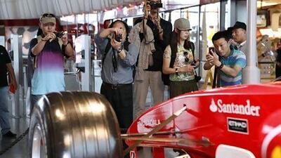 Chinese tour operators visit Ferrari World yesterday as part of their tour of Abu Dhabi's top tourist destinations. Antonie Robertson / The National