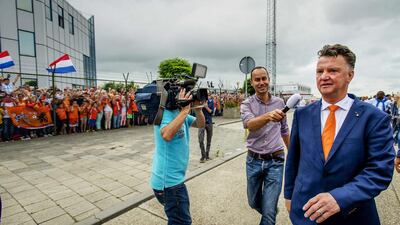 Netherlands coach Louis van Gaal, right, pictured arriving at Rotterdam The Hague Airport in Rotterdam, the Netherlands, on July 13, 2014, went straight into his new job with Manchester United rather than take a post-World Cup holiday. Robin van Lonkhuijsen / EPA