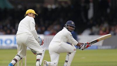 West Indies great Brian Lara, in action with MCC, plays a shot at the Lord's Bicentenary match on Saturday. Behind him, Rest of the World XI wicketkeeper Adam Gilchrist. Lara made 23 runs from 38 balls in the match. Ian Kington / AFP