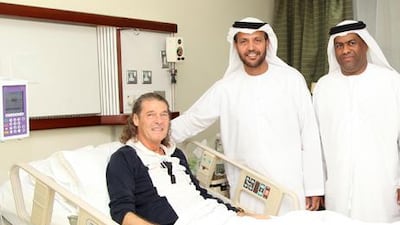 Al Wasl coach Bruno Metsu is visited in hospital by board members from the club.