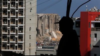 Damaged apartment buildings and the ruins of a silo at Beirut's port. Getty Images.