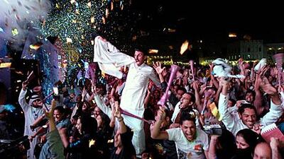 Doha residents celebrate after the Gulf state was chosen to host the 2022 World Cup.