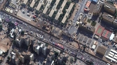 Members of an Iraqi Shiite armed group and their supporters gather at the eastern entrance of the US Embassy compound in Baghdad. EPA