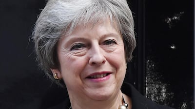 British Prime Minister Theresa May. A no-deal Brexit will see the UK economy shrink 1.6 per cent next year. EPA/ANDY RAIN