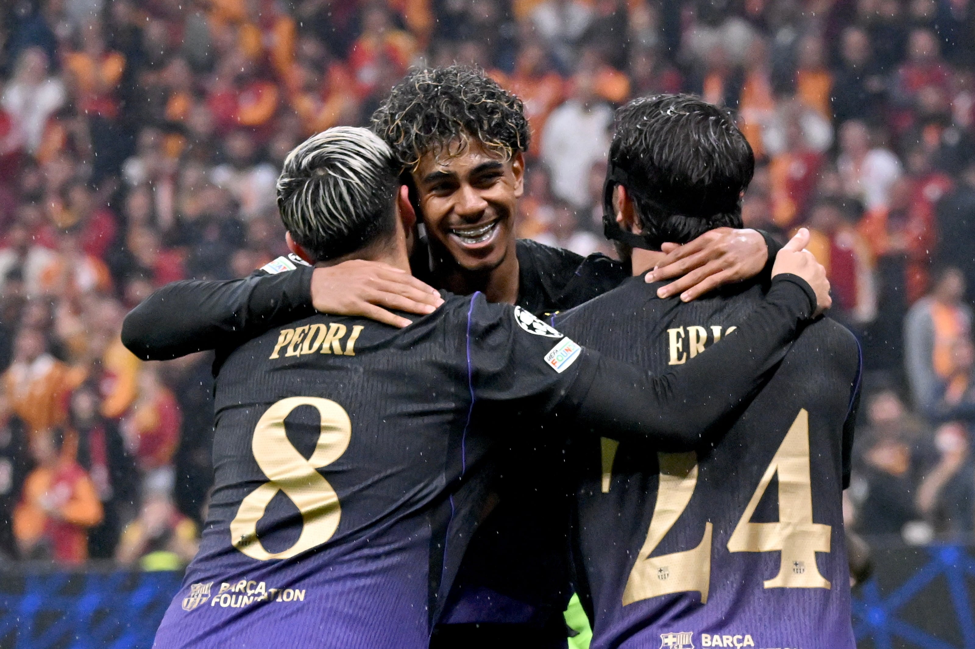 Lamine Yamal celebrates with Pedri and Eric Garcia during their Champions League win over Galatasaray in Istanbul. EPA