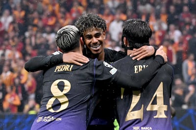 Lamine Yamal celebrates with Pedri and Eric Garcia during their Champions League win over Galatasaray in Istanbul. EPA