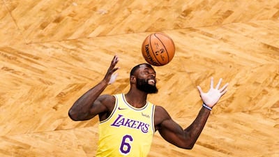 The Lakers' Lance Stephenson tries to grab the ball during an NBA match in Brooklyn, New York. EPA