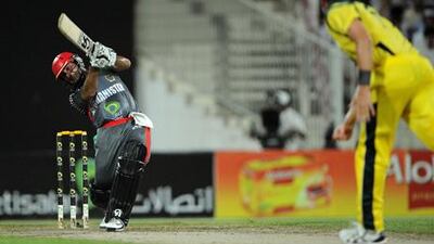 Afghanistan's Asghar Stanikzai plays a shot during the one day international against Australia in Sharjah.