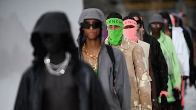 Models present a creation by US fashion designer Matthew Williams during the Givenchy menswear spring/summer 2023 at Paris Fashion Week, on June 22, 2022. AFP