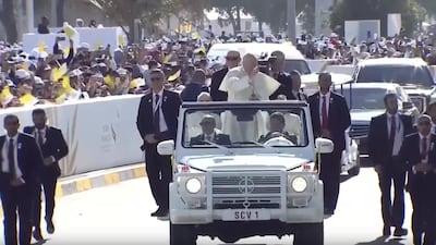 Pope Francis rides his Mercedes Benz 'Popemobile' G Wagon to Mass in Abu Dhabi.