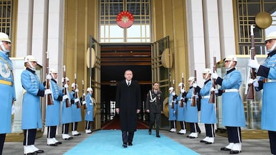 Turkey's president Tayyip Erdogan, centre, at a welcoming ceremony at the presidential palace in Ankara on March 12, 2015. Kayhan Ozer/Presidential palace press office handout via Reuters (