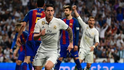 Real Madrid’s James Rodriguez celebrates after scoring to tie the match at 2-2 at the 85th minute. Pierre-Philippe Marcou / AFP