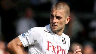 Mladen Petric scored twice and set up one in his debut for Fulham in the 5-0 rout of Norwich City.