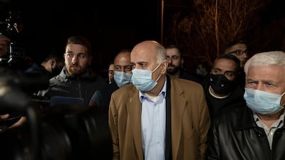 Senior Fatah official Jibril Rajoub, center, arrives at the Palestinian Central Election Commission office to register the party's official list for the upcoming parliamentary election in May, in the West Bank city of Ramallah. AP Photo