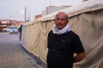 Naeem Moatasem, father of Maryam, who died in a wedding hall fire, attends her funeral in Qaraqosh, Iraq. Ismael Adnan for The National