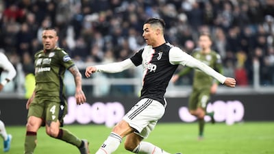 Cristiano Ronaldo scores Juventus' fourth goal to complete his hat-trick against Cagliari. Reuters
