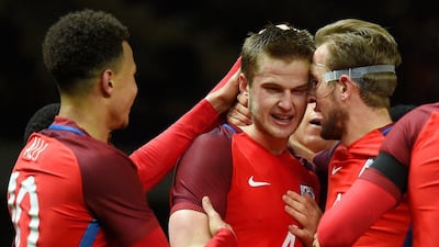 Eric Dier (C) of England celebrates scoring his team's third goal with his team mates Dele Alli (L) and Harry Kane (R) during the International Friendly match between Germany and England at Olympiastadion on March 26, 2016 in Berlin, Germany. (Photo by Mike Hewitt/Getty Images)