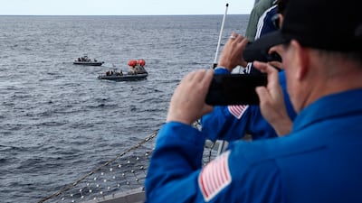 Flight surgeons from the Johnson Space Centre follow the recovery mission. EPA