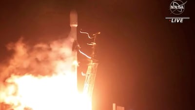 In this image taken from NASA video, the SpaceX Falcon 9 rocket with the Double Asteroid Redirection Test, or DART, spacecraft onboard, lifts off Tuesday, Nov. 23, 2021, from Vandenberg Space Force Base in Calif. NASA launched the spacecraft Tuesday night on a mission to smash into an asteroid and test whether it would be possible to knock a speeding space rock off course if one were to threaten Earth. (NASA via AP)