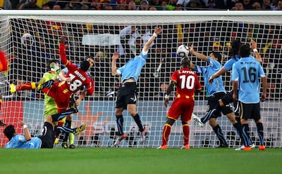 Luis Suarez of Uruguay handles the ball on the goal line, for which he is sent off, during the 2010 Fifa World Cup South Africa quarter-final between Uruguay and Ghana at the Soccer City stadium in Johannesburg on July 2, 2010. Getty