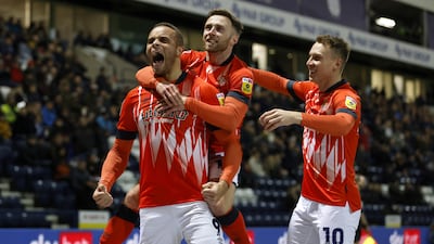 Carlton Morris, left, scored 20 goals this season - the third-most in the Championship - to help Luton into the play-offs. PA