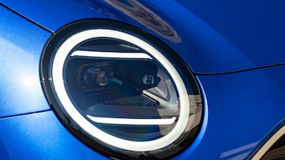 The front is adorned with large round eyes and the grille is covered by a shiny black panel