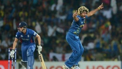 Sri Lanka’s Lasith Malinga, right, took five wickets for 31 runs against England last night.