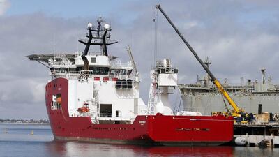 The Australian Defence Vessel Ocean Shield loads up with supplies at HMAS Stirling naval base near Perth. The ship is being tasked to drag a US Navy Supervisor of Salvage and Diving towed pinger locator, an undersea Navy drone capable of exploring waters nearly 15,000 feet deep. Jason Reed / Reuters March 30