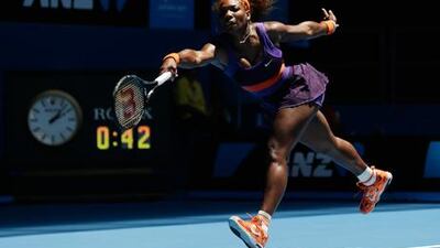 Serena Williams stretches to return a shot from Edina Gallovits-Hall at the Australian Open.