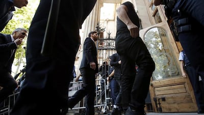 Lionel Messi, centre, arrives to court with his father Jorge Horacio Messi, right, to stand trial for tax fraud in Barcelona, Spain, June 2, 2016. Albert Gea / Reuters