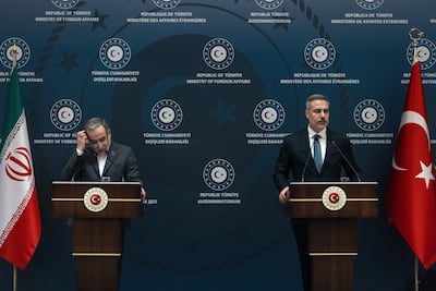 Iran's Abbas Araghchi, left, and Turkey's Hakan Fidan, right, at a press conference in Istanbul. Getty Images