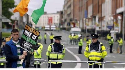 Members of the Republican group Eirigi gather on O'Connell Street in Dublin to demonstrate against the visit of Britain's Queen to Ireland.