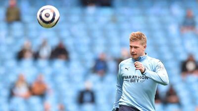 Manchester City's Belgian midfielder Kevin De Bruyne warms up for the English Premier League match against Everton at the Etihad Stadium in Manchester, north west England, on May 23, 2021. AFP