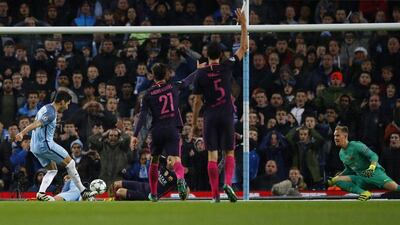 Ilkay Gundogan shoots to score Manchester City’s third goal. Phil Noble / Reuters