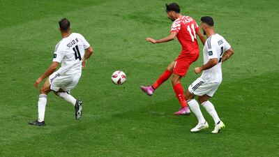 Jordan's Yazan Al Naimat scores their opener. Reuters