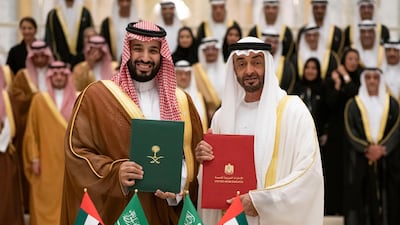 Mohamed bin Zayed, Crown Prince of Abu Dhabi and Deputy Supreme Commander of the UAE Armed Forces, right, and Prince Mohamed bin Salman, Crown Prince, Deputy Prime Minister and Minister of Defence of Saudi Arabia, stand for a photograph after signing the minutes of the Saudi-Emirati Coordination Council during a state visit at Qasr Al Watan. All photos by Ministry of Presidential Affairs