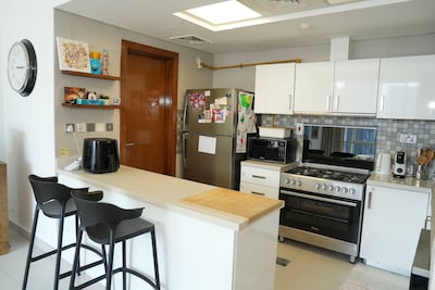 The three-bed family home has an open-plan kitchen. Pawan Singh for The National