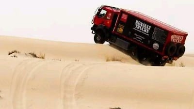 Test driver Gilles Chauve drives a 30-tonne Renault GVW Kerax 6x6 off-road truck through sand dunes in Dubai.