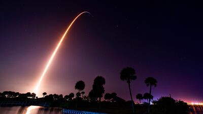 A SpaceX Falcon rocket launches from Kennedy Space Centre for the International Space Station. The time exposure of launch was taken from Kelly Park on Merritt Island. AP