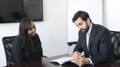 Paris Norriss, founder of Coba Education, right meets with recruitment consultant Naima Ismail. Reem Mohammed/ The National