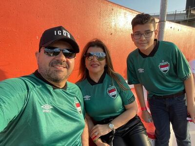 Dr Ali Khayat and his family watch Iraq take on Syria in a World Cup qualifier in Dubai. Photo: Dr Ali Khayat