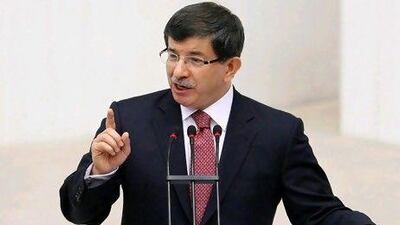 Turkey's foreign minister Ahmet Davutoglu says a security zone could be erected as a reaction ‘against terrorism or a big flow or refugees’ into Turkey.