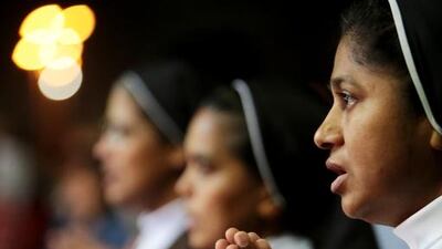 Nuns pray during the mass. Christopher Pike / The National