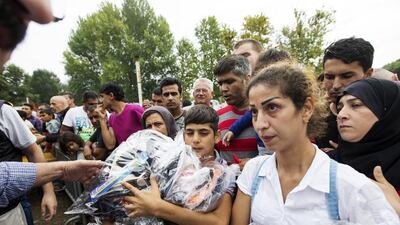 Refugees receive care packages.