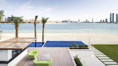 The villa includes an infinity pool, Jacuzzi and lawn area which runs at the same level as the beach. Courtesy Knight Frank