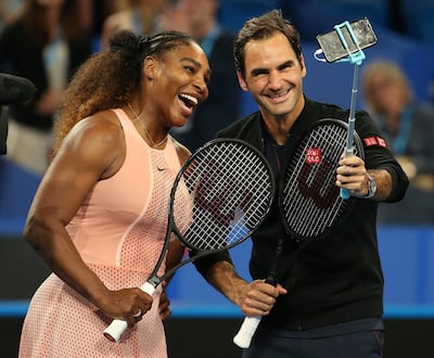 Serena Williams and Roger Federer take a selfie following their mixed doubles match at the 2019 Hopman Cup in Perth, Australia. Getty Images
