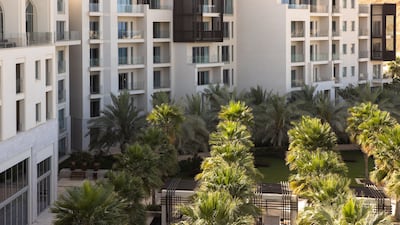 The hotel is flanked by mountains on three sides